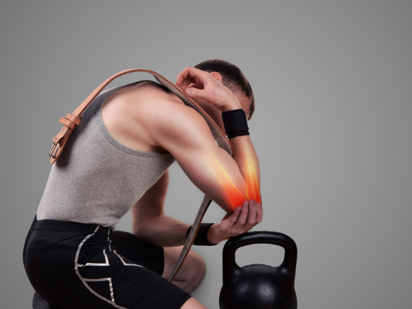 Penyebab dan Solusi Nyeri Siku Akibat Angkat Beban Berlebihan